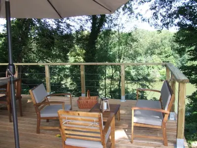 Balcon ou terrasse dans l'établissement LES GITES DU PARC KOTA DOUBLE climatisé
