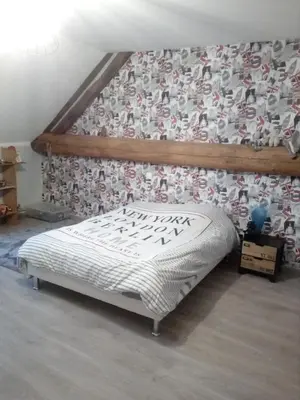 Un ou plusieurs lits dans un hébergement de l'établissement Chambres chez l habitant