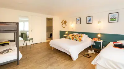 Un ou plusieurs lits dans un hébergement de l'établissement Hôtel Les Hauts de Meursault