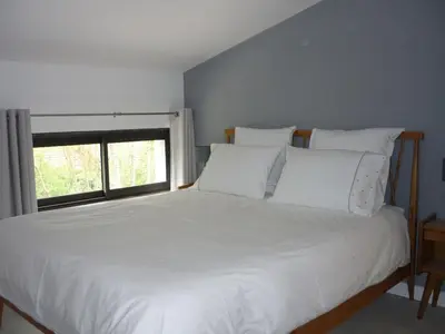 Un ou plusieurs lits dans un hébergement de l'établissement Atelier 2 - for 6 people with shared pool