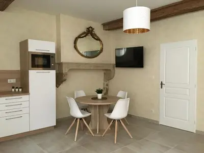 Cuisine ou kitchenette dans l'établissement Chez Maufoux - Centre - Hospices - Climatisation