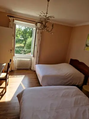 Un ou plusieurs lits dans un hébergement de l'établissement Hôtel De La Ferté