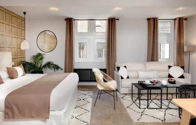 Coin salon dans l'établissement Maison des Ducs