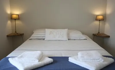 Un ou plusieurs lits dans un hébergement de l'établissement La Maison de Jules