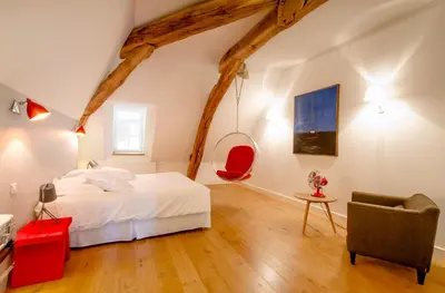 Un ou plusieurs lits dans un hébergement de l'établissement Chambres d'hôtes Le Clos des Tilleuls