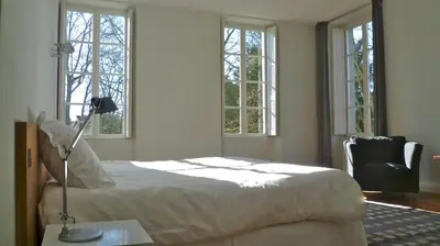 Un ou plusieurs lits dans un hébergement de l'établissement Chambres d'hôtes Le Clos des Tilleuls