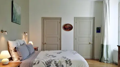 Un ou plusieurs lits dans un hébergement de l'établissement Le Clos des Roseaux