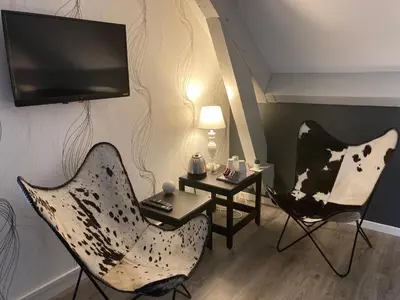 Télévision ou salle de divertissement dans l'établissement Clos de belle roche