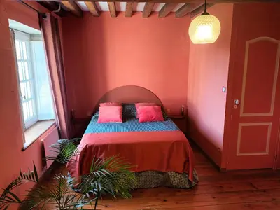 Un ou plusieurs lits dans un hébergement de l'établissement Gîte Design