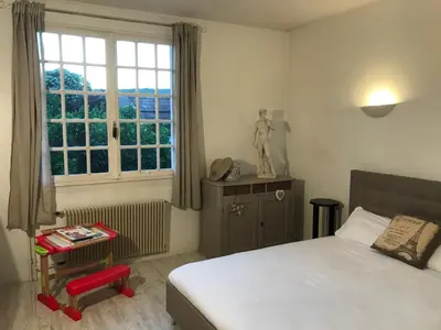 Un ou plusieurs lits dans un hébergement de l'établissement Les portes du vignoble