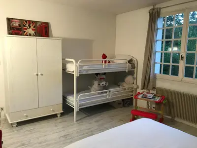 Un ou plusieurs lits dans un hébergement de l'établissement Les portes du vignoble