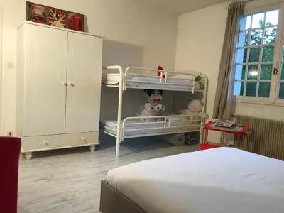 Un ou plusieurs lits dans un hébergement de l'établissement Les portes du vignoble
