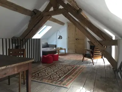 Coin salon dans l'établissement Orangerie du chateau de Quemigny sur Seine