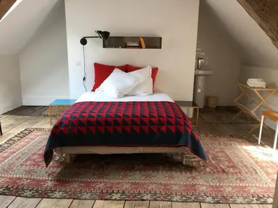 Un ou plusieurs lits dans un hébergement de l'établissement Orangerie du chateau de Quemigny sur Seine