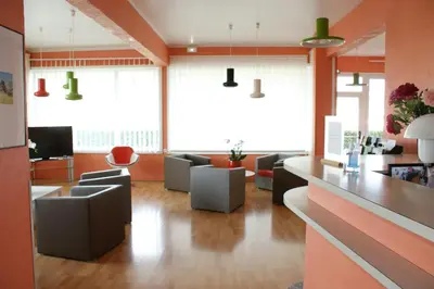 Coin salon dans l'établissement Hotel Val Vert