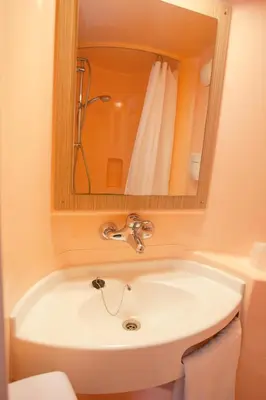 Salle de bains dans l'établissement Première Classe Dijon Nord - Zénith