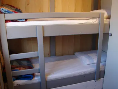 Un ou plusieurs lits superposés dans un hébergement de l'établissement Camping Moulin de Collonge