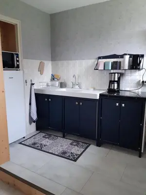 Cuisine ou kitchenette dans l'établissement Escale en Revermont