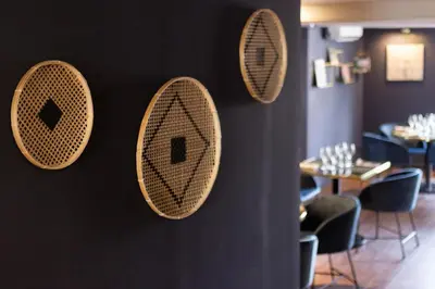 Coin salon dans l'établissement Hôtel - Restaurant Le Globe