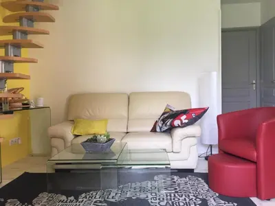 Coin salon dans l'établissement Maison à la Campagne à 2km du Circuit de Bresse