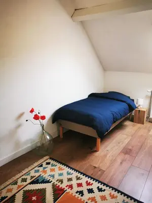Un ou plusieurs lits dans un hébergement de l'établissement Au bord de Seille