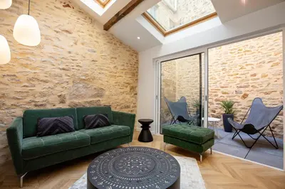 Coin salon dans l'établissement Maison Tillot
