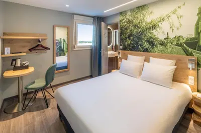 Un ou plusieurs lits dans un hébergement de l'établissement Sure Hotel by Best Western Dole