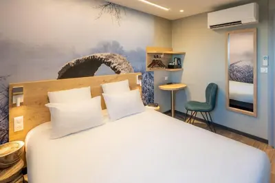 Un ou plusieurs lits dans un hébergement de l'établissement Sure Hotel by Best Western Dole