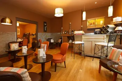 Coin salon dans l'établissement Hotel-restaurant Les Caudalies