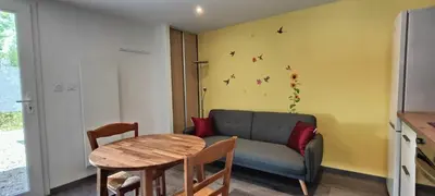Coin salon dans l'établissement Le domaine du Parc Thermal