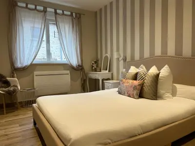 Un ou plusieurs lits dans un hébergement de l'établissement Maison Grandjean