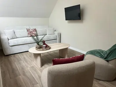 Coin salon dans l'établissement Maison Grandjean