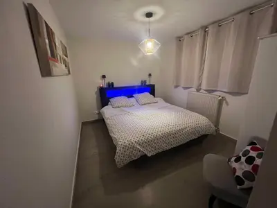 Un ou plusieurs lits dans un hébergement de l'établissement Le gîte du cavalier au cœur de la Forêt/jacuzzi