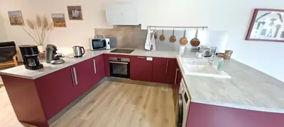 Cuisine ou kitchenette dans l'établissement Au Petit Pressoir
