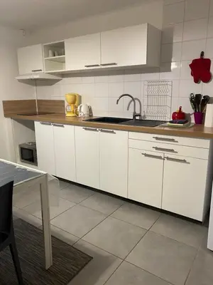 Cuisine ou kitchenette dans l'établissement Le Mathiez
