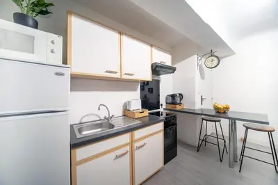 Cuisine ou kitchenette dans l'établissement Myappart71 - Studio - cosy au centre ville