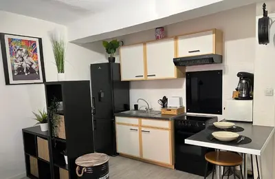 Cuisine ou kitchenette dans l'établissement Myappart71 - Studio - cosy au centre ville