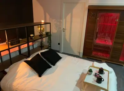 Un ou plusieurs lits dans un hébergement de l'établissement Appartement Spa - NAHLEO Industriel