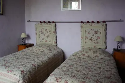 Un ou plusieurs lits dans un hébergement de l'établissement Gîte des Grands Narreaux