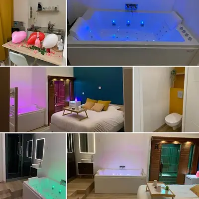 Un ou plusieurs lits dans un hébergement de l'établissement Appartement Spa - NAHLEO Scandinave