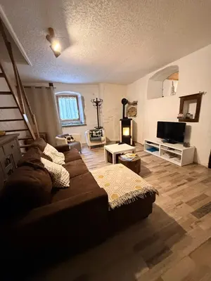 Télévision ou salle de divertissement dans l'établissement Gîte des reculées
