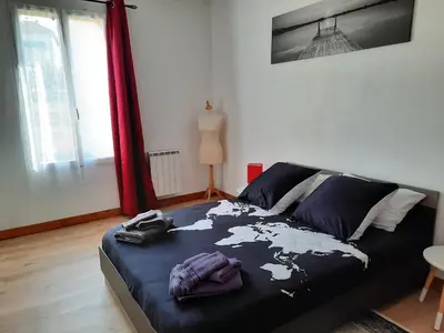 Un ou plusieurs lits dans un hébergement de l'établissement Le studio d Olivia
