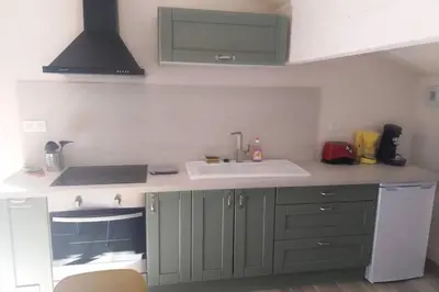 Cuisine ou kitchenette dans l'établissement Gîte Mamie Cocotte