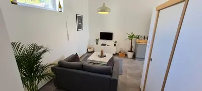 Télévision ou salle de divertissement dans l'établissement Chez Charles Centre-Parking privé-Hospices-Gare