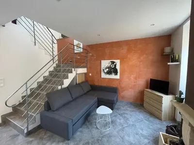 Télévision ou salle de divertissement dans l'établissement Gîte de la Grenouillette