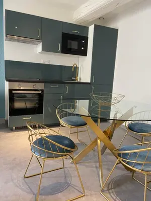 Cuisine ou kitchenette dans l'établissement La Terrasse du Faubourg