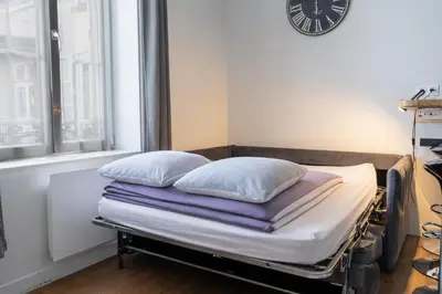 Un ou plusieurs lits dans un hébergement de l'établissement La petite cour
