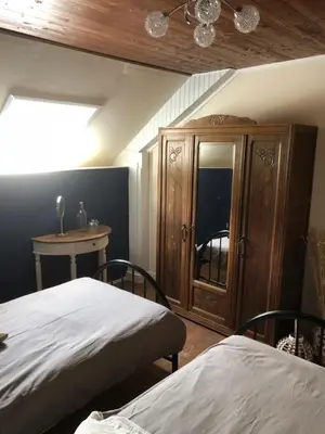 Un ou plusieurs lits dans un hébergement de l'établissement Maison Moulin Bousset