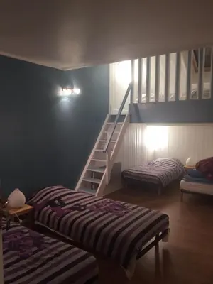 Un ou plusieurs lits dans un hébergement de l'établissement Chambres d'Hôtes Pom' Paille