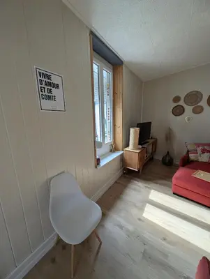 Un ou plusieurs lits dans un hébergement de l'établissement Charmant duplex 100m2